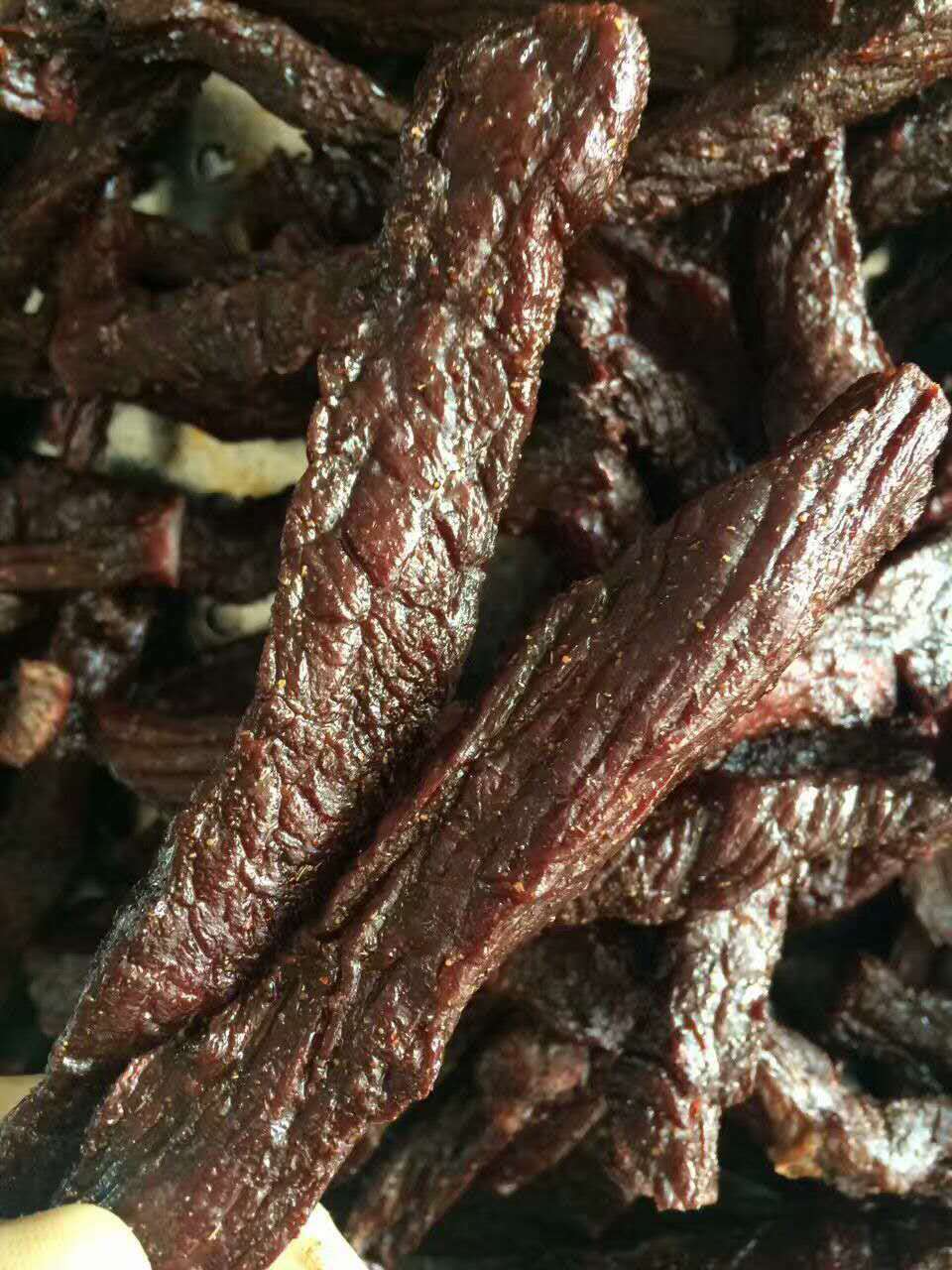 这是第3张纯正风干牛肉干纯手工古法制作真正的老味道的货源图片